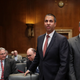 FCC Chairman Ajit Pai (L) and FTC Chairman Joseph Simons prepare to testify before the Senate Financial Services and General Government Subcommittee in the Dirksen Senate Office Building on Capitol Hill May 07, 2019 in Washington, DC.